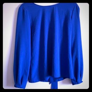 Key whole back blouse